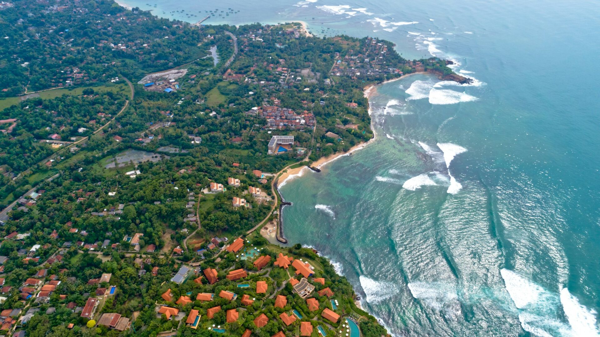 Aerial of seaside fishermen village in Sri lanka